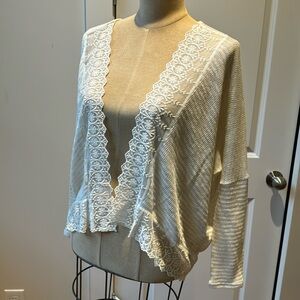 Monteau of Los Angeles cream and tan striped knit cardigan with lace trim. Small